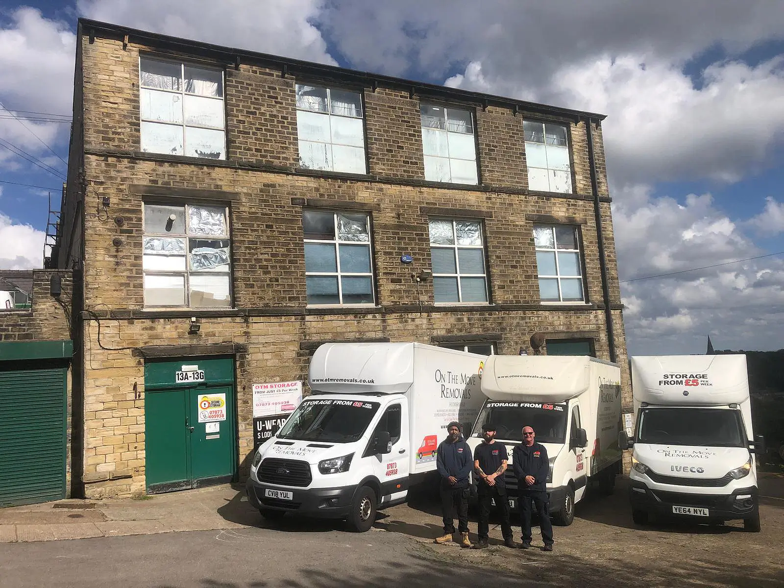 picture of on the move removals team in front of vans