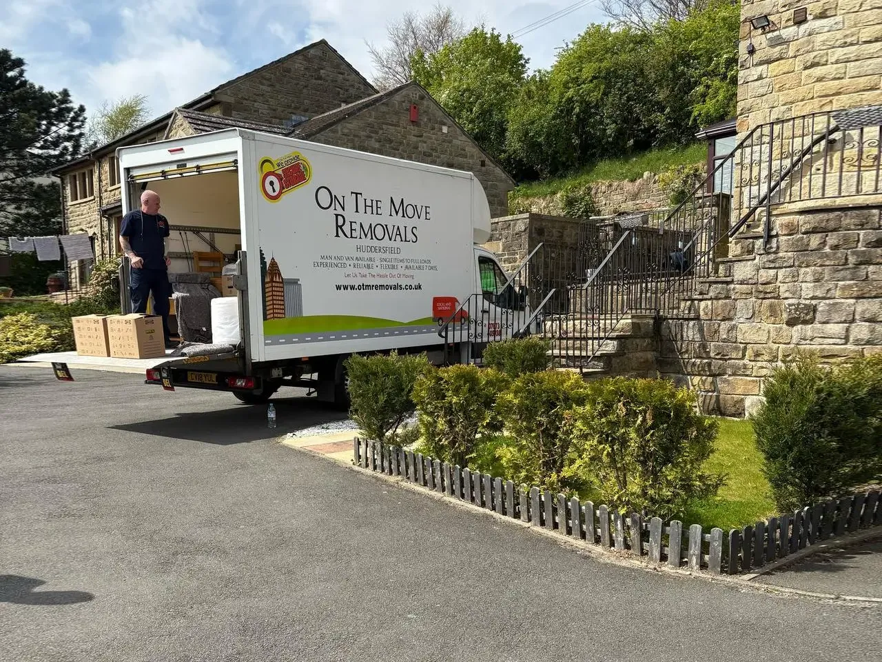 Shaun from On The Move Removals on the van tailgate, ready for a Huddersfield moving day