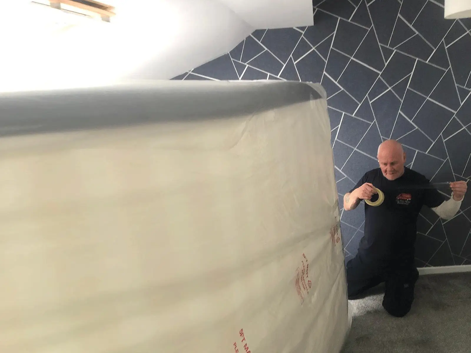 picture of on the move removals packing a bed